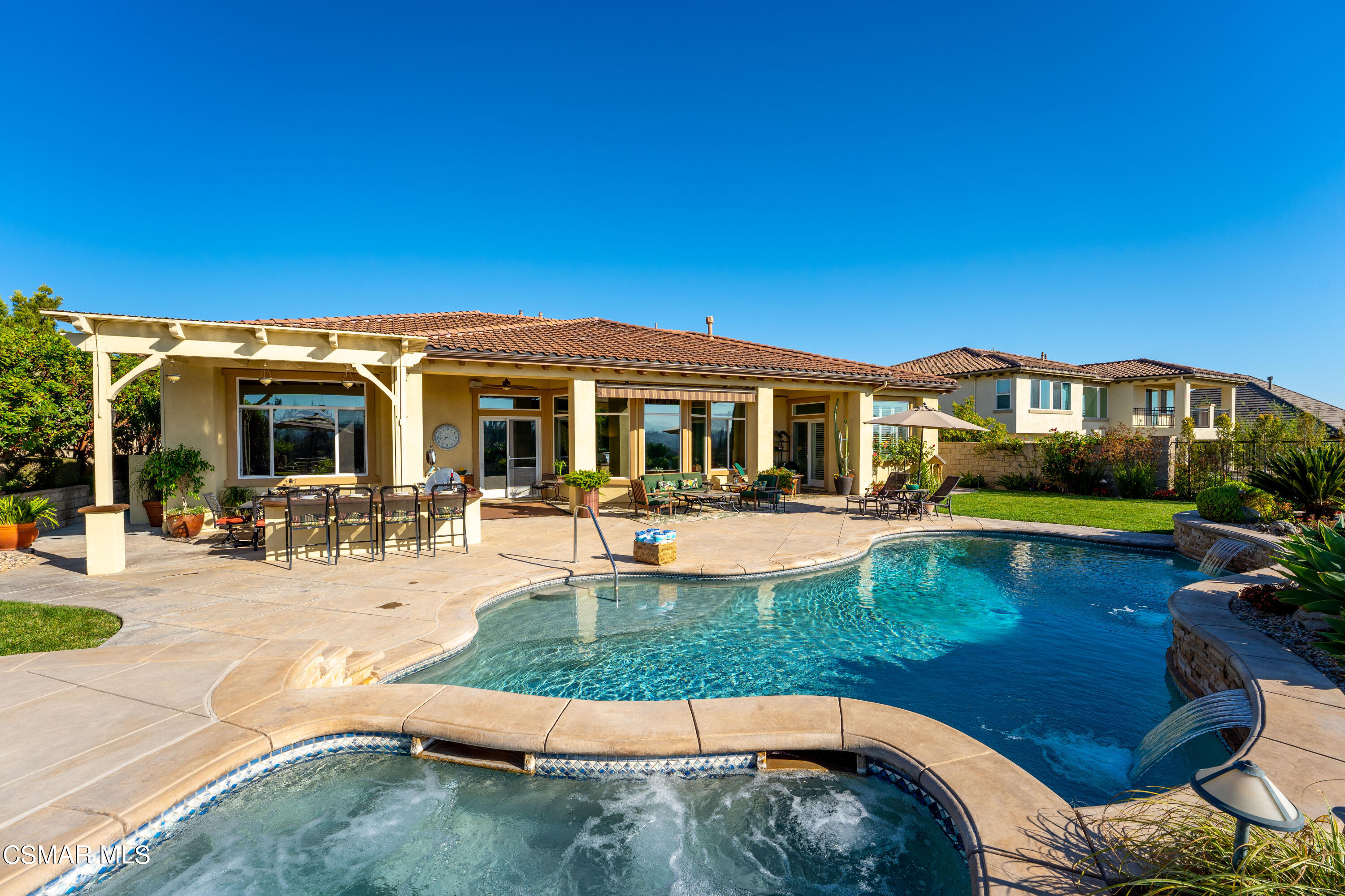 7343 Nicklaus Road Moorpark, CA 93021 - Photo 34 of 42 a view of a house with swimming pool and porch