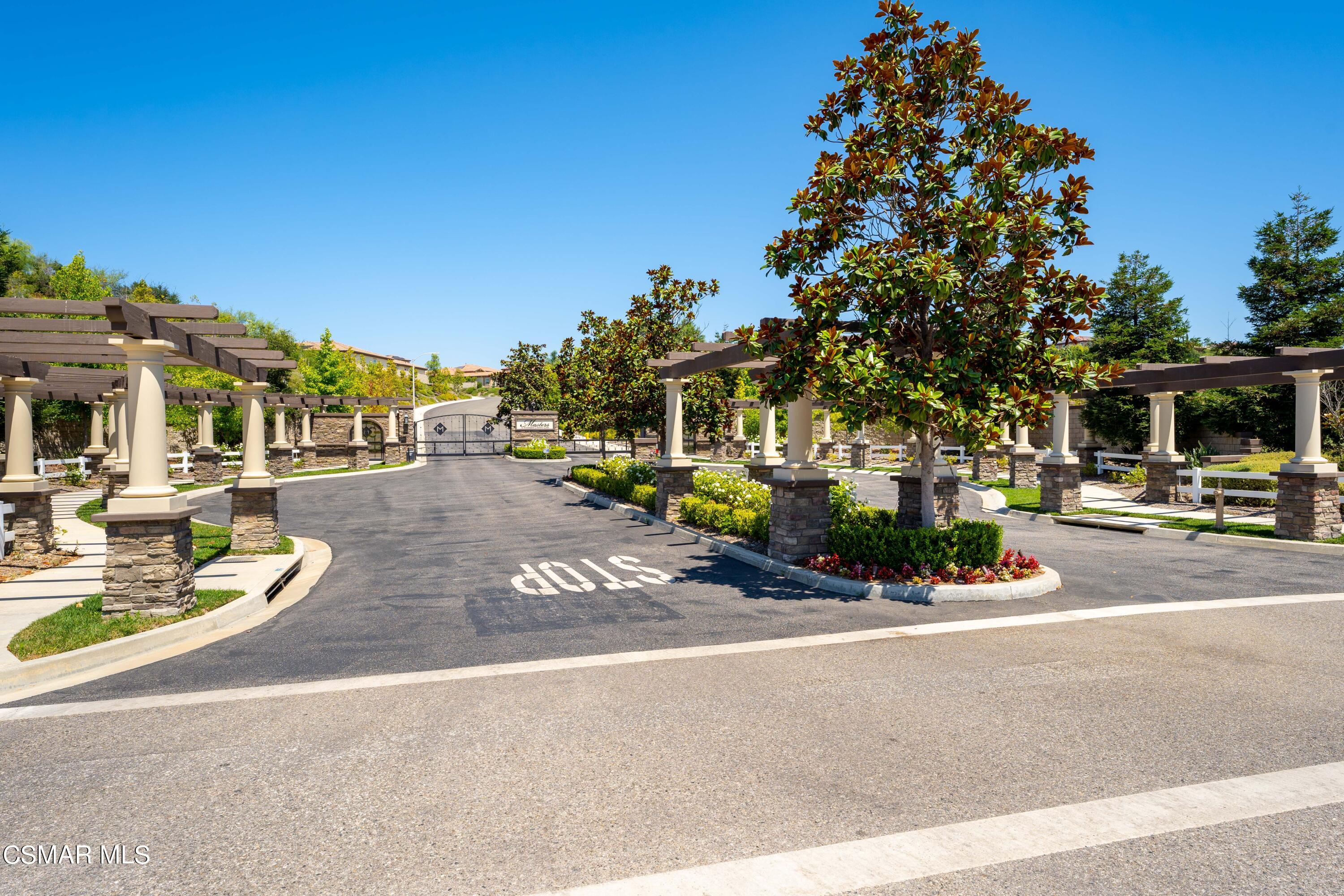7343 Nicklaus Road Moorpark, CA 93021 - Photo 38 of 42 a view of a street with houses
