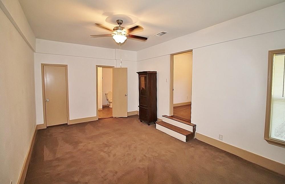 112 Trailwood Road Enchanted Oaks, TX 75156 - Photo 4 of 15 a view of an empty room with a window