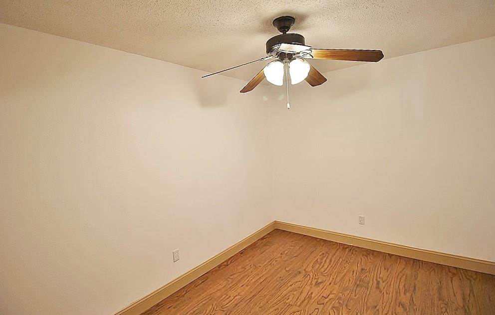 112 Trailwood Road Enchanted Oaks, TX 75156 - Photo 10 of 15 a view of a small space with wooden floor
