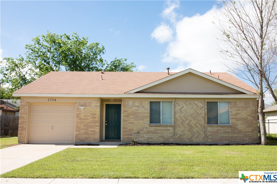 1704 Mona Drive Killeen, TX 76549 - Photo 1 of 1 a front view of a house with a yard