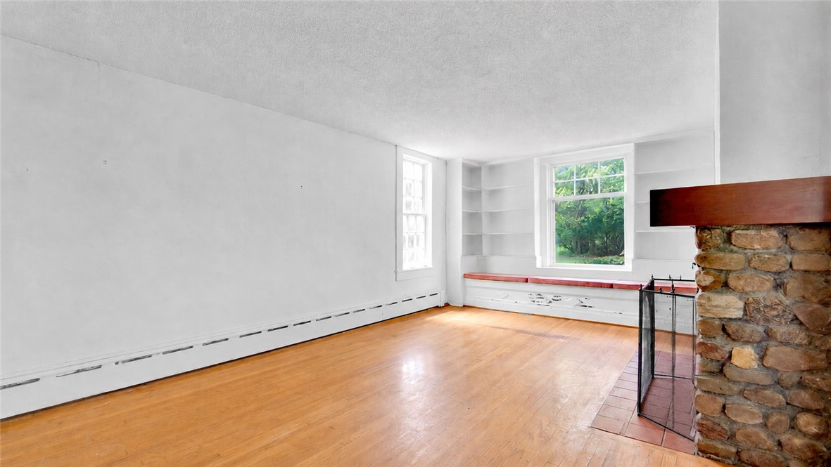 150 William Kidder Road Lancaster, NY 14086 - Photo 8 of 39 The 12' x 19' Front Room featuring a large window,