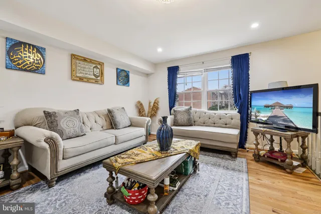 a living room with furniture and a table