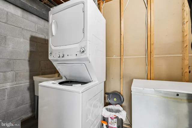 a bathroom with a toilet and shower