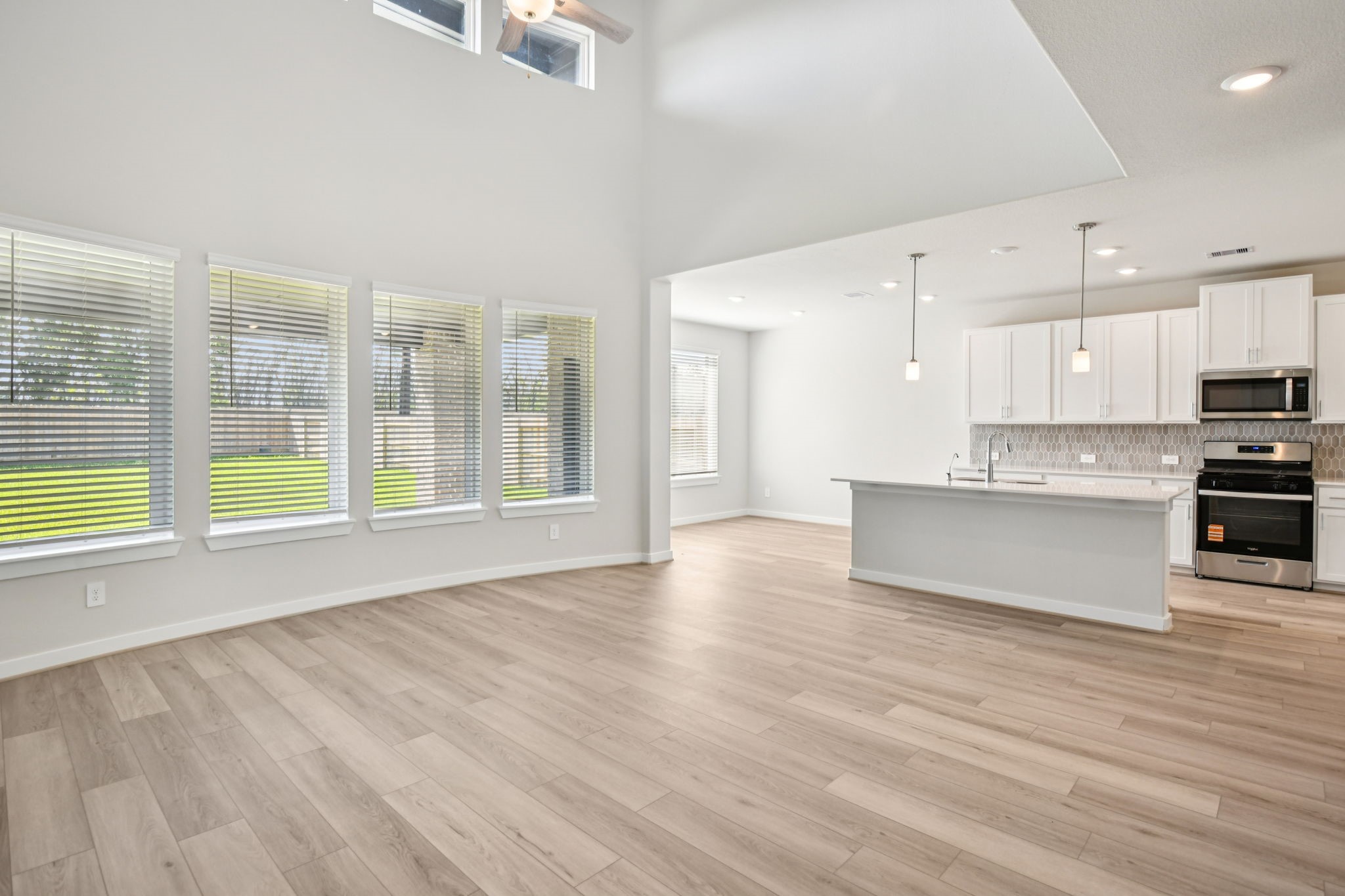 2843 Dark Lantern Drive Rosenberg, TX 77471 - Photo 5 of 49 a view of kitchen with wooden floor and electronic appliances