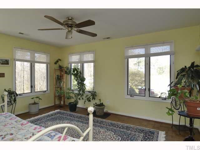 12517 Old Creedmoor Road Raleigh, NC 27613 - Photo 5 of 12 a living room with furniture and a window