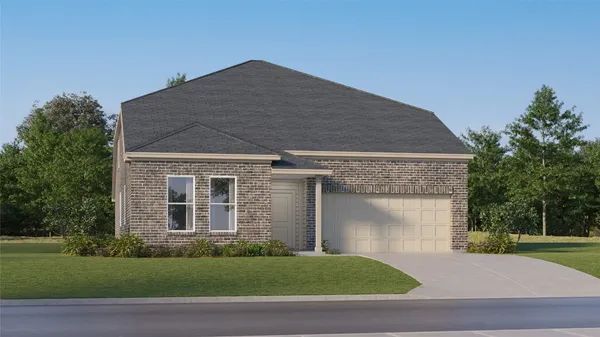 a front view of a house with a garden and yard