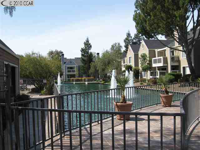 245 Reflections Drive, Unit 14 San Ramon, CA 94583 - Photo 1 of 1 a view of a chair and table in the balcony