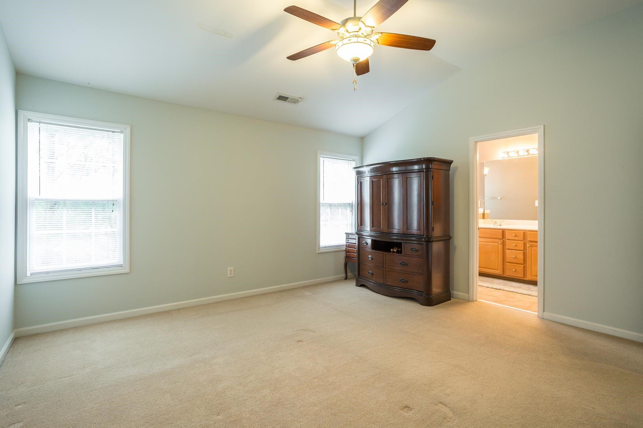 6905 Middleboro Drive Raleigh, NC 27612 - Photo 15 of 23 The private and spacious master bedroom is perfectly situated on the backside of the home with beautiful nature views. Master Bedroom