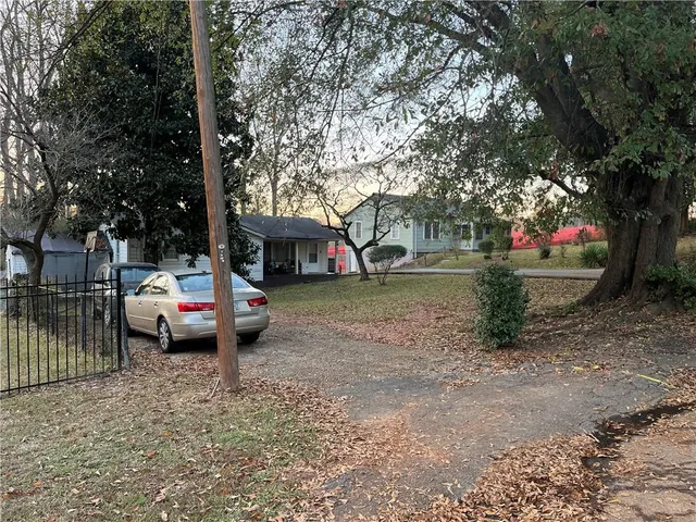 a view of street with parked cars