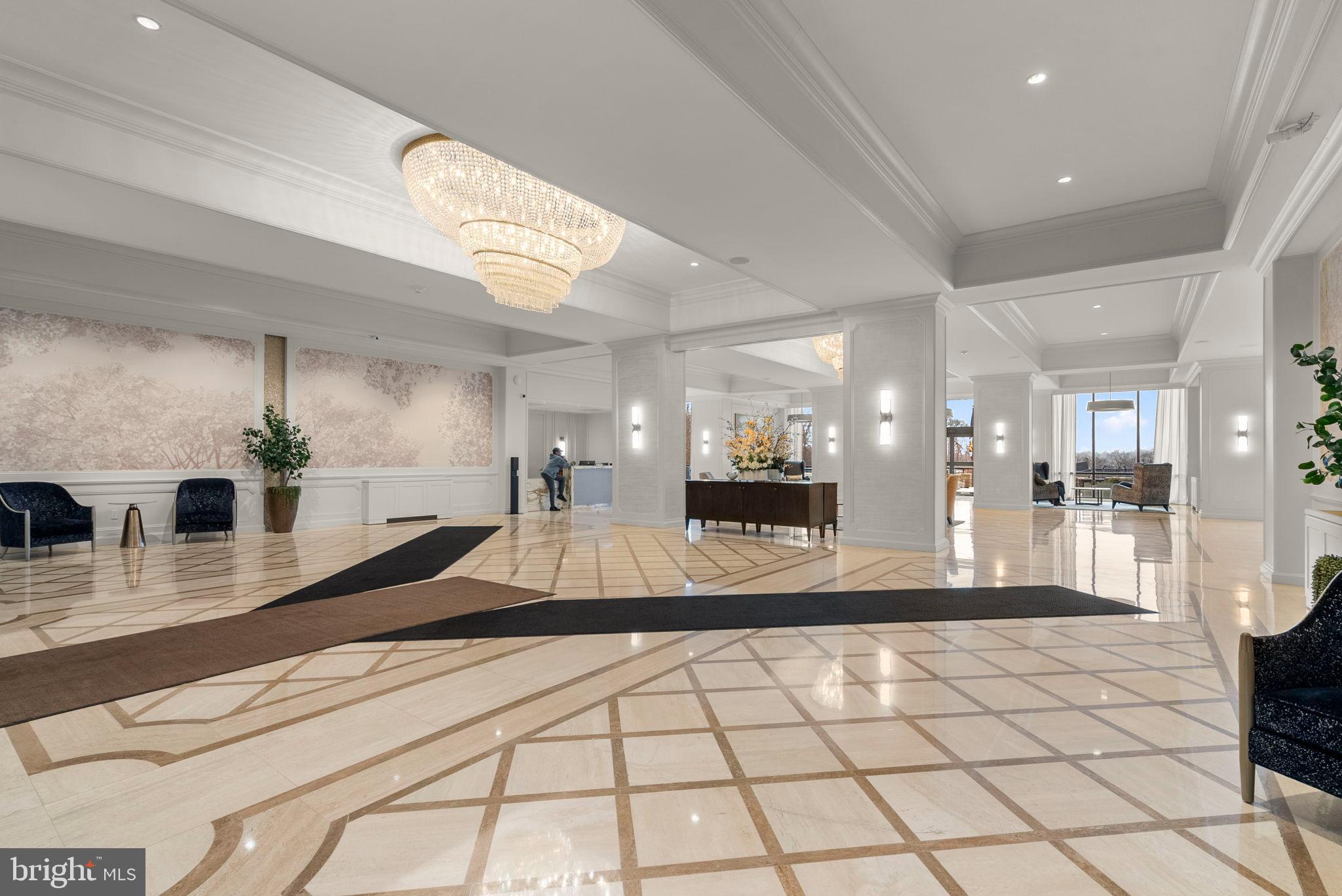 Elegant lobby with stunning chandelier.