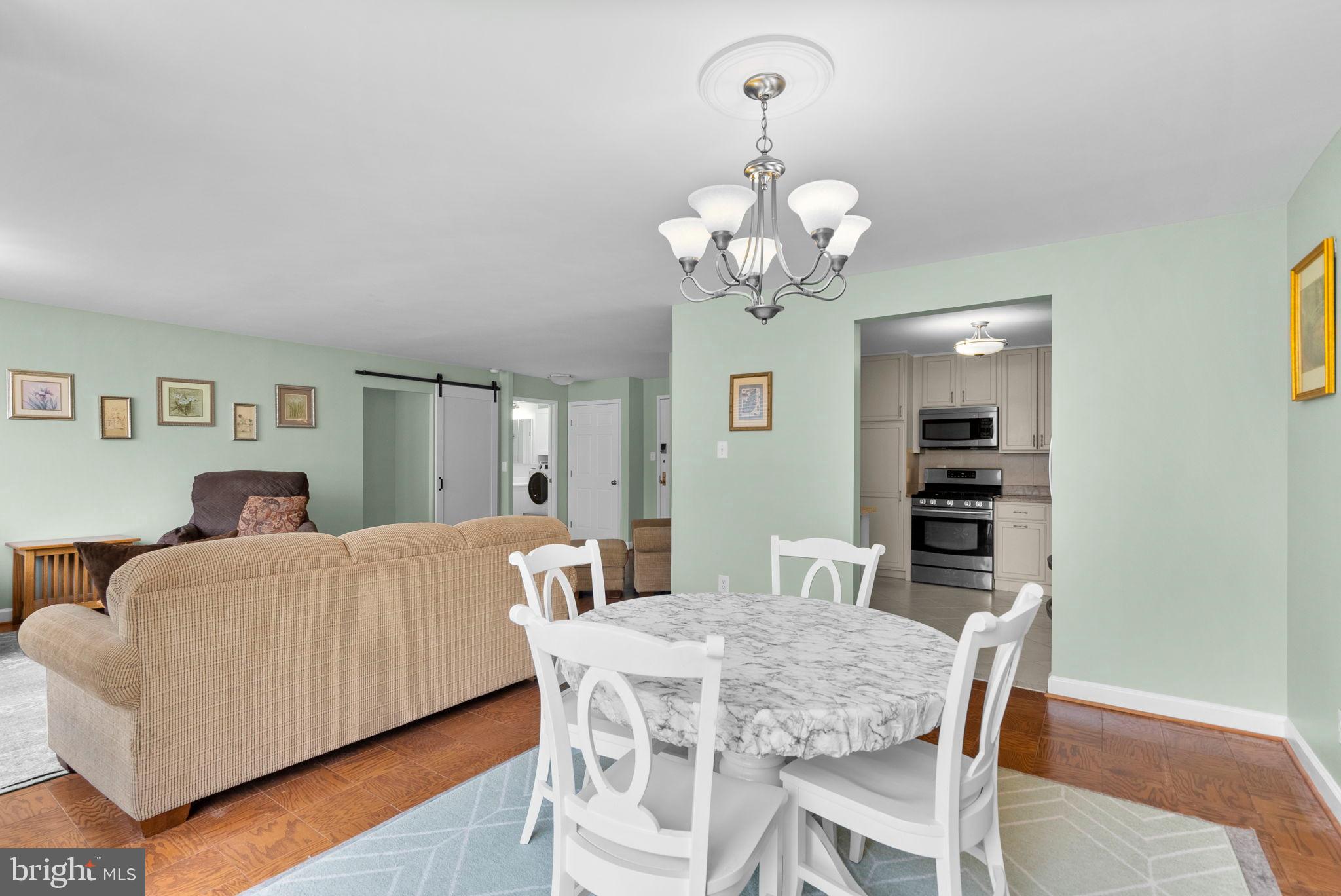 5225 Pooks Hill Road, Unit A24S Bethesda, MD 20814 - Photo 11 of 22 Charming open-concept living space awaits.