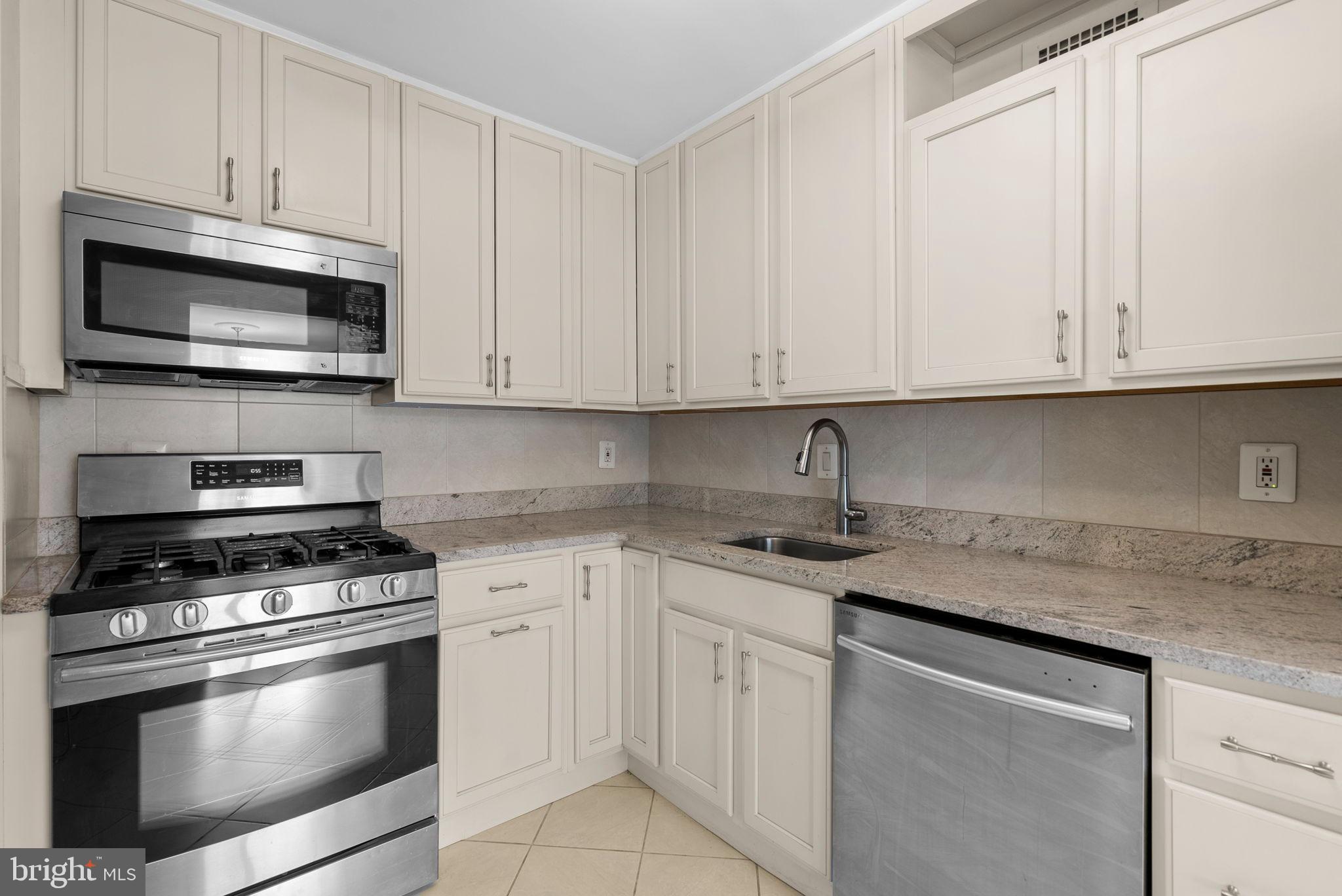 5225 Pooks Hill Road, Unit A24S Bethesda, MD 20814 - Photo 13 of 22 Modern kitchen with sleek appliances.