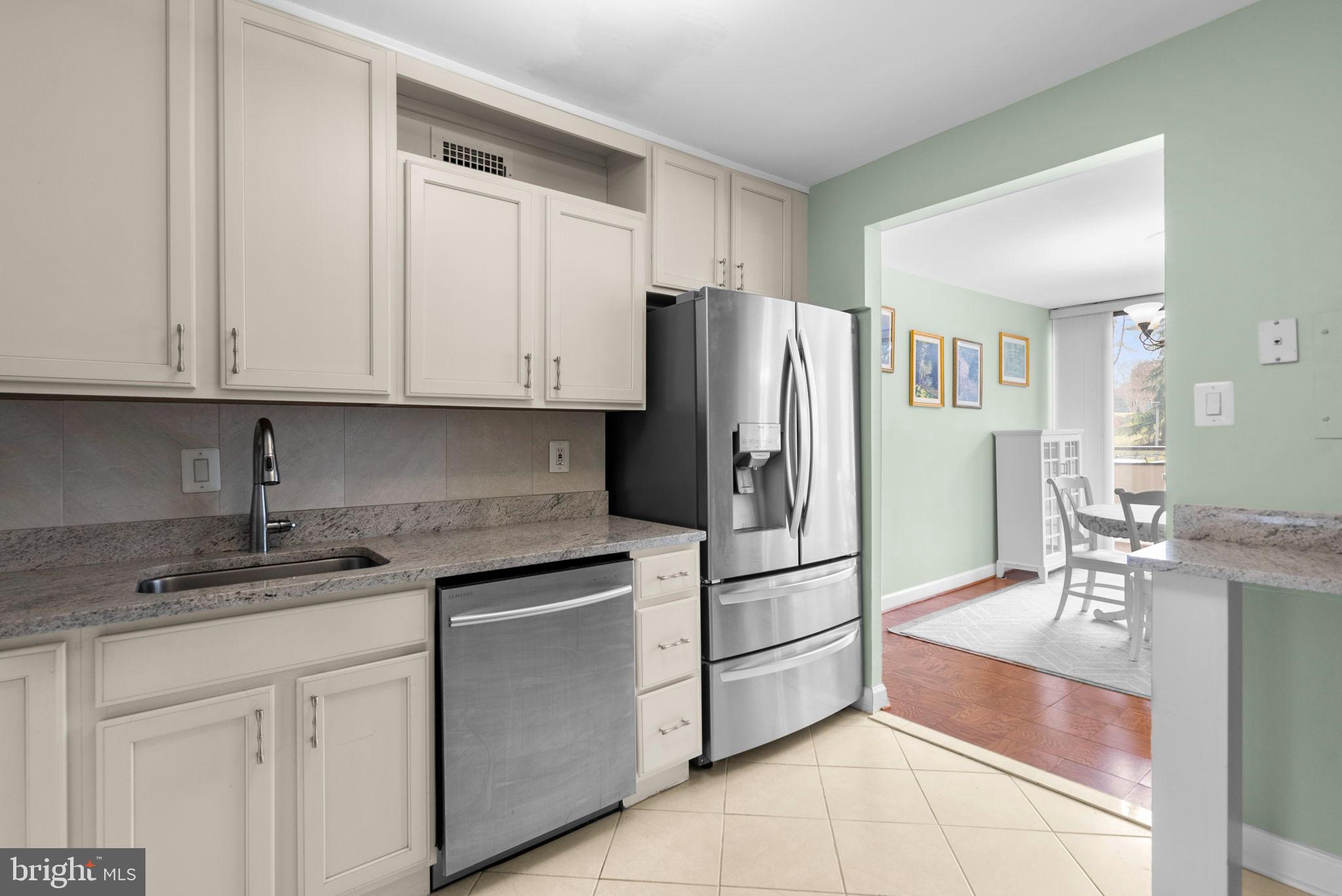 5225 Pooks Hill Road, Unit A24S Bethesda, MD 20814 - Photo 14 of 22 Modern kitchen with sleek appliances.