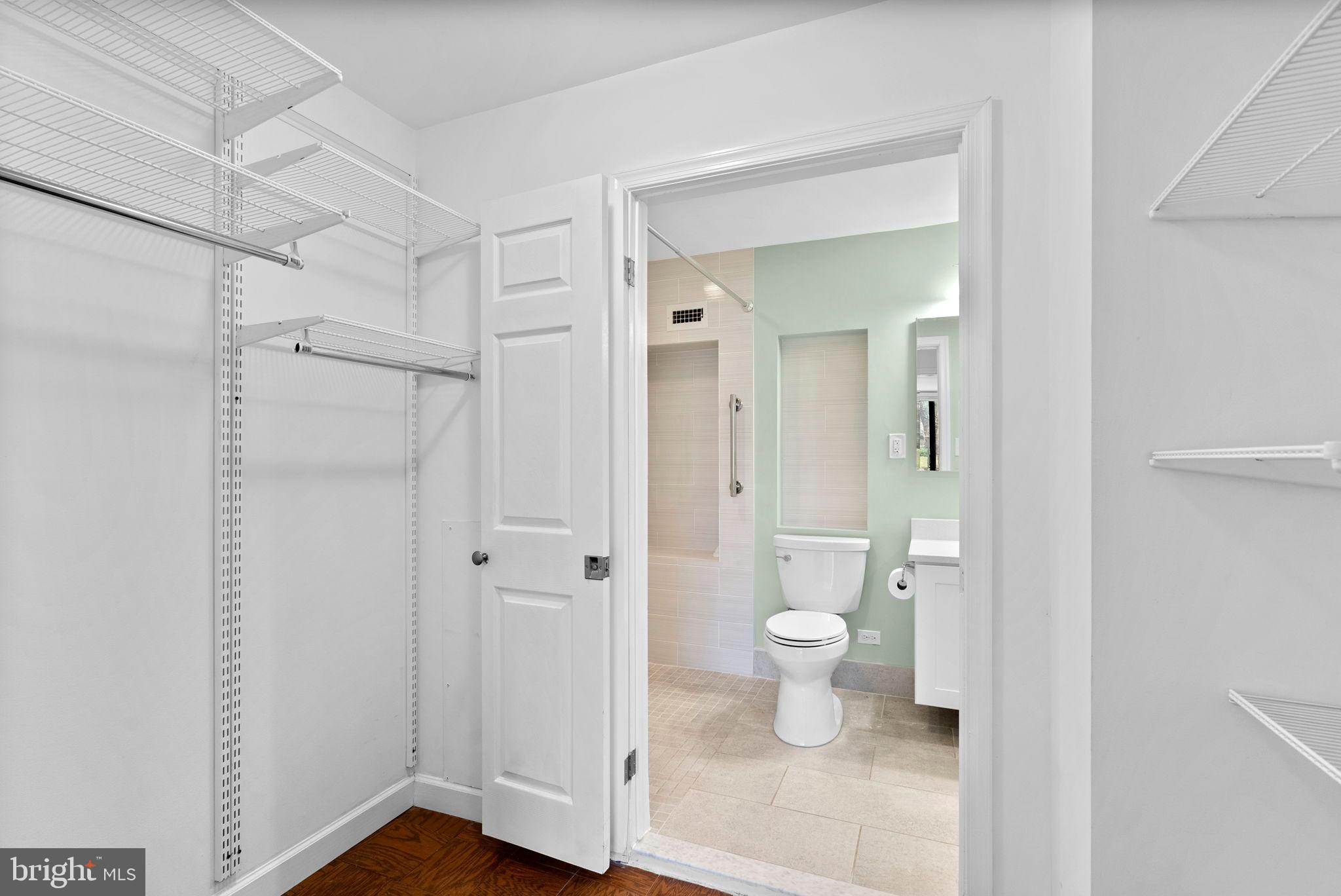 5225 Pooks Hill Road, Unit A24S Bethesda, MD 20814 - Photo 18 of 22 Spacious closet with adjoining bathroom access.