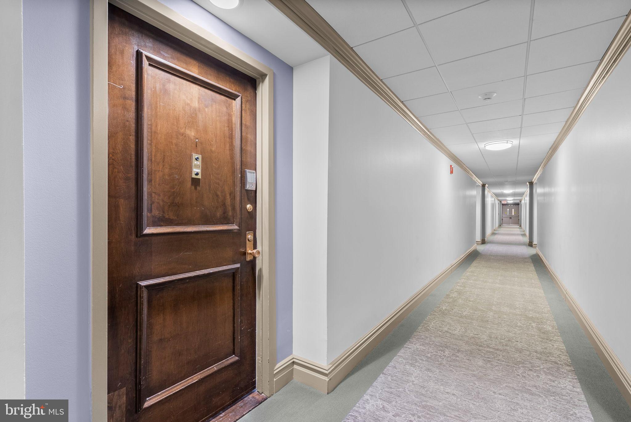 5225 Pooks Hill Road, Unit A24S Bethesda, MD 20814 - Photo 4 of 22 Inviting entrance to a serene hallway.