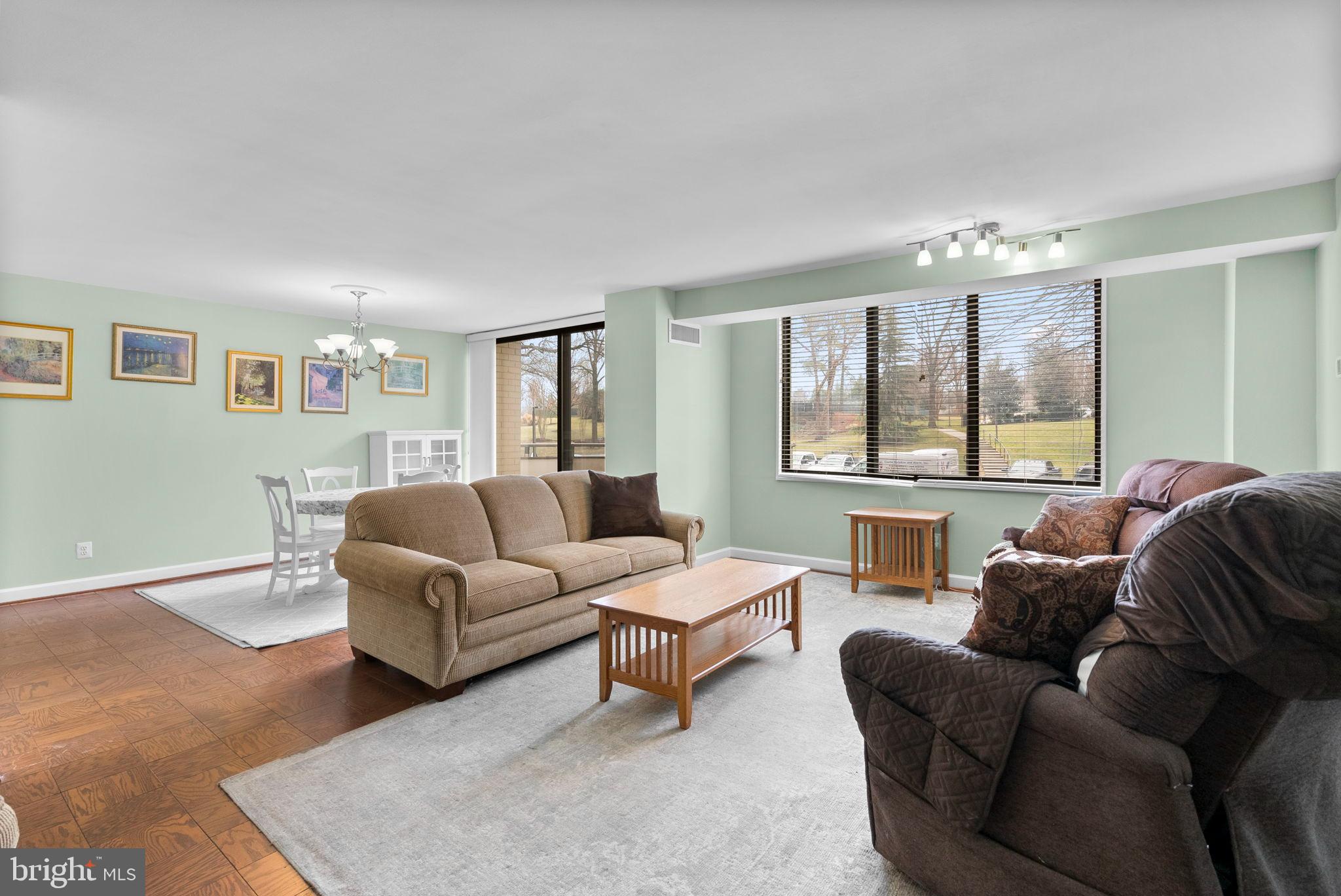 5225 Pooks Hill Road, Unit A24S Bethesda, MD 20814 - Photo 6 of 22 Bright and inviting living space with views.