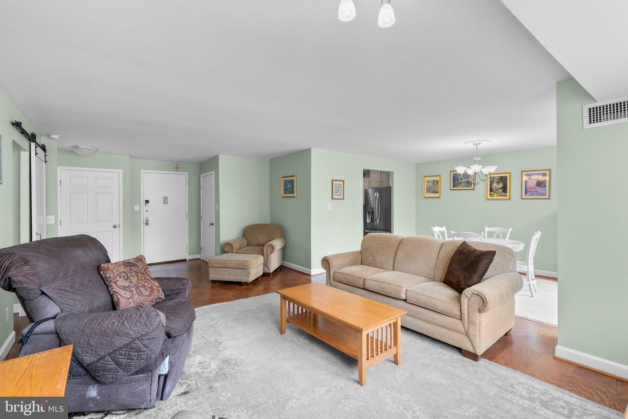 5225 Pooks Hill Road, Unit A24S Bethesda, MD 20814 - Photo 7 of 22 Spacious living area with inviting ambiance.