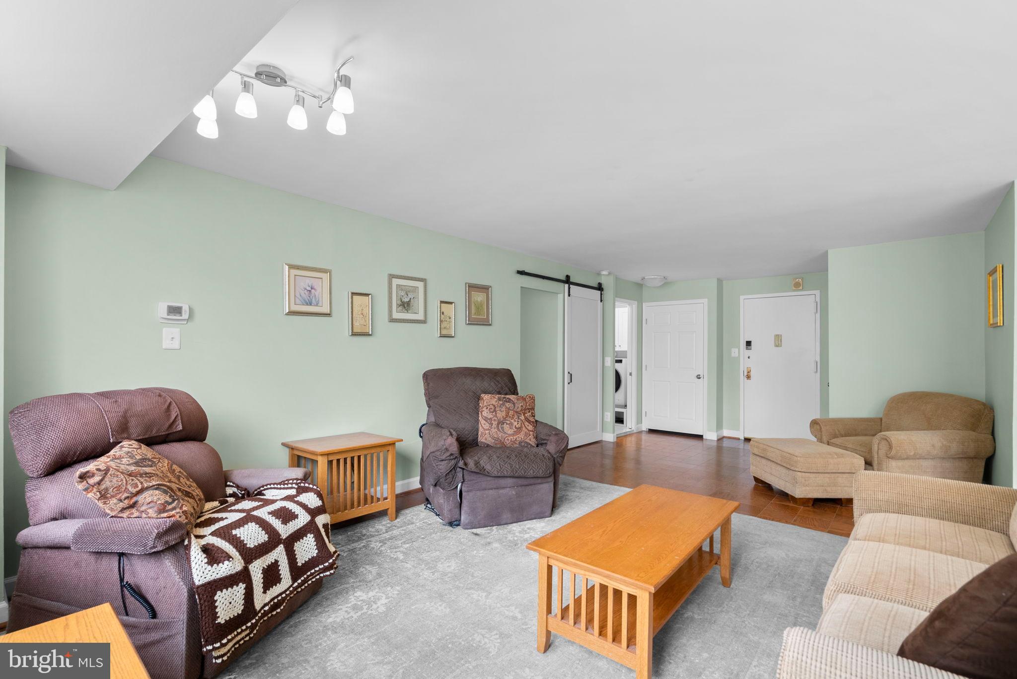 5225 Pooks Hill Road, Unit A24S Bethesda, MD 20814 - Photo 8 of 22 Spacious living area with inviting ambiance.