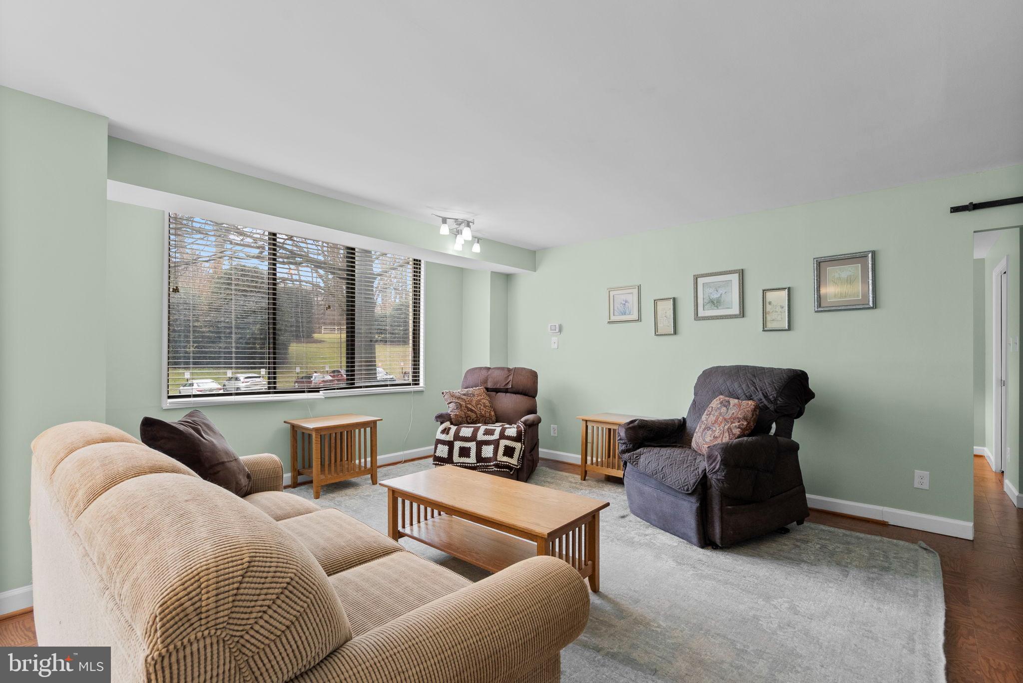 5225 Pooks Hill Road, Unit A24S Bethesda, MD 20814 - Photo 9 of 22 Bright and inviting living space with views.