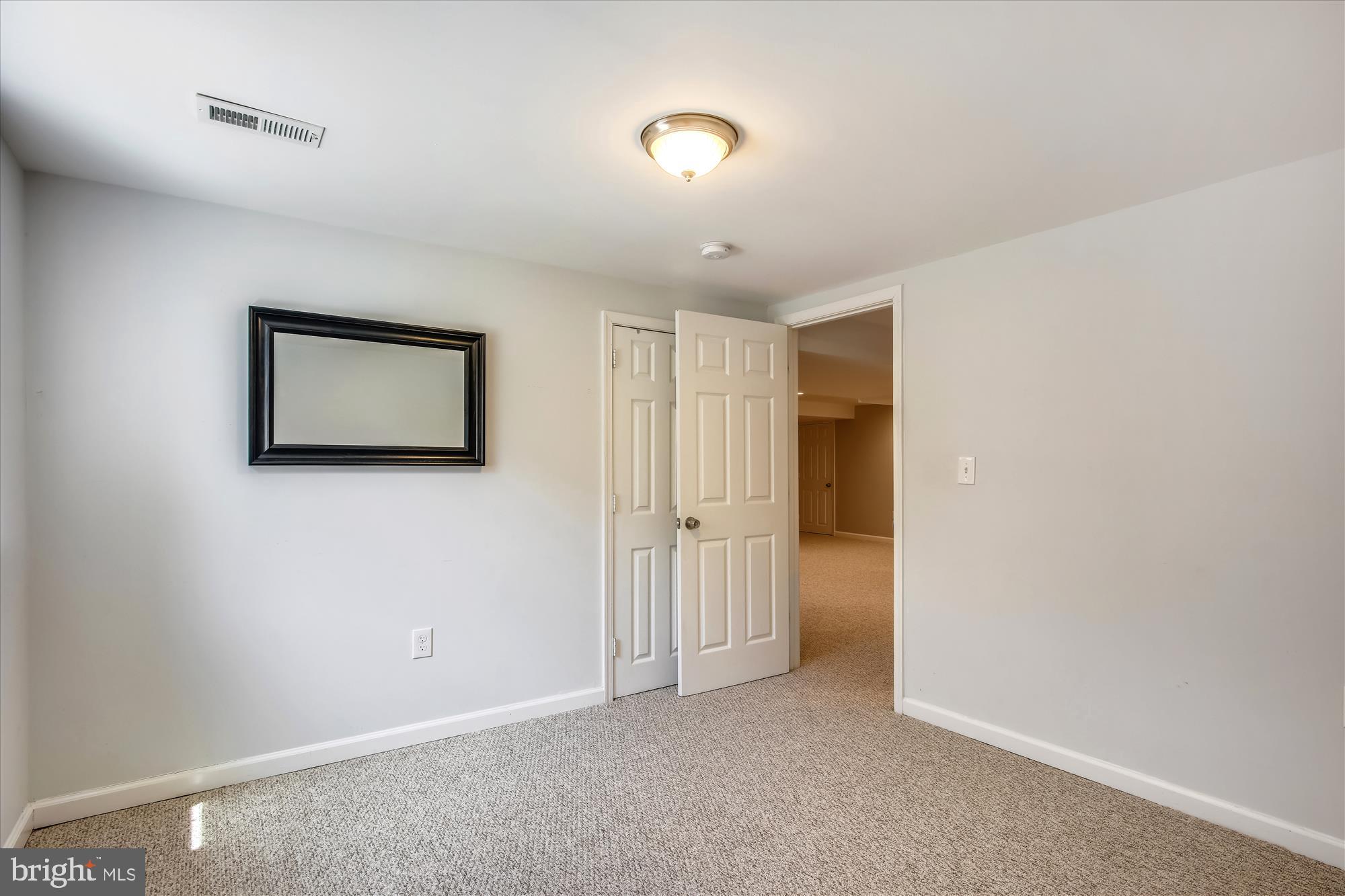 12409 Connecticut Avenue Silver Spring, MD 20906 - Photo 52 of 67 Lower Level Bedroom 1