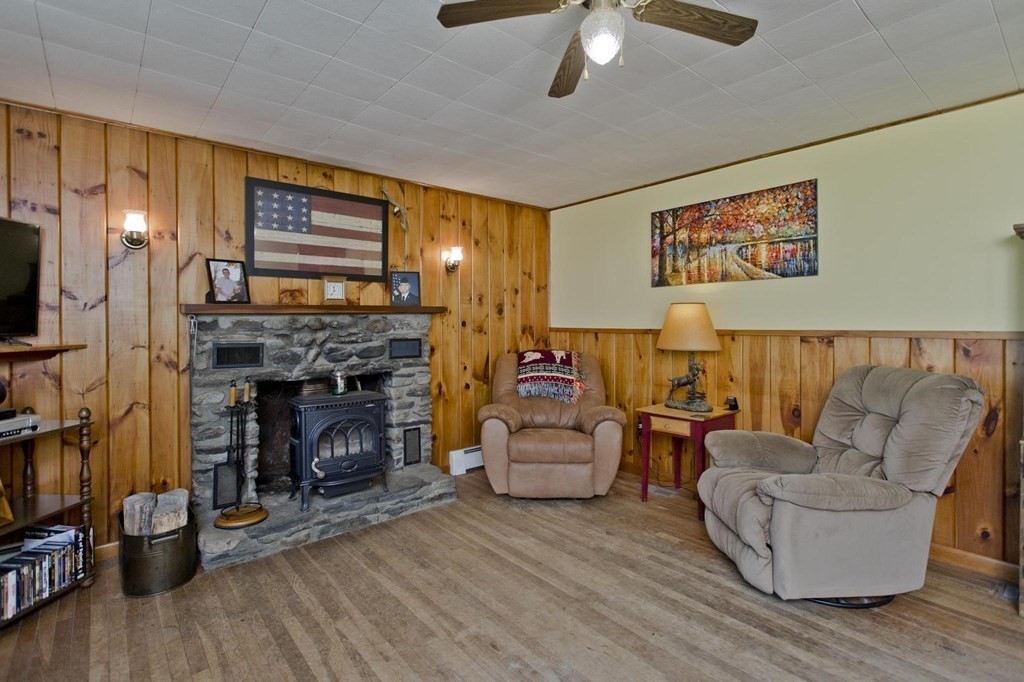 128 S Road Heath, MA 01346 - Photo 14 of 30 a living room with furniture and a fireplace