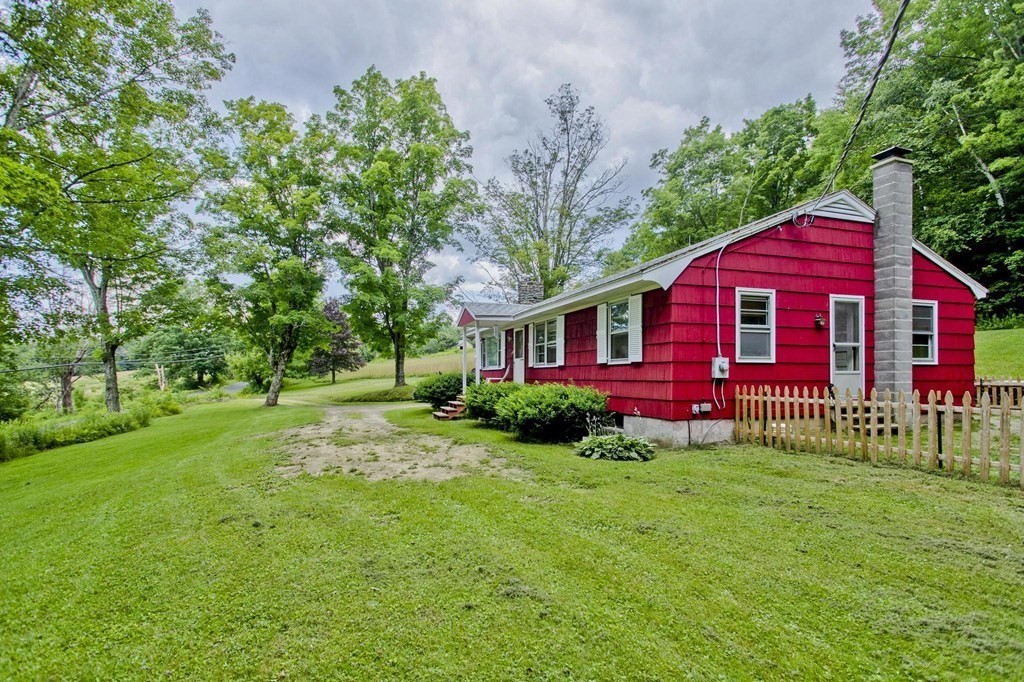 128 S Road Heath, MA 01346 - Photo 2 of 30 a front view of a house with yard and green space