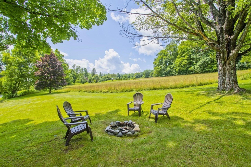 128 S Road Heath, MA 01346 - Photo 4 of 30 a backyard of a house with table and chairs