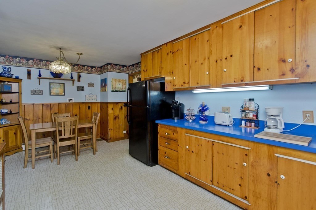 128 S Road Heath, MA 01346 - Photo 9 of 30 a kitchen with stainless steel appliances granite countertop a sink and cabinets
