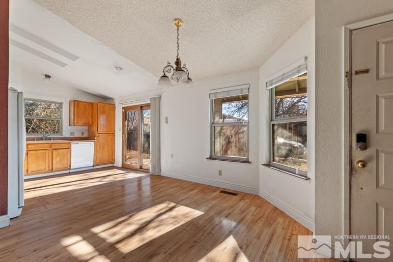 1020 Big Springs Road Reno, NV 89523 - Photo 3 of 17 a view of an empty room with a window