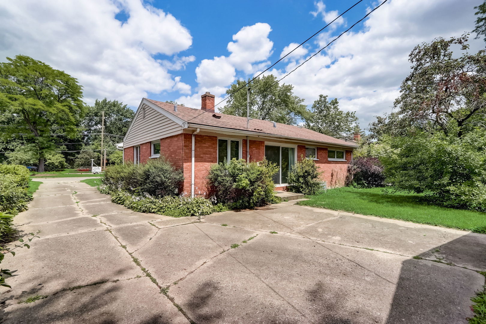 547 East Baldwin Road Palatine, IL 60074 - Photo 22 of 26 a view of a house with yard and a garden