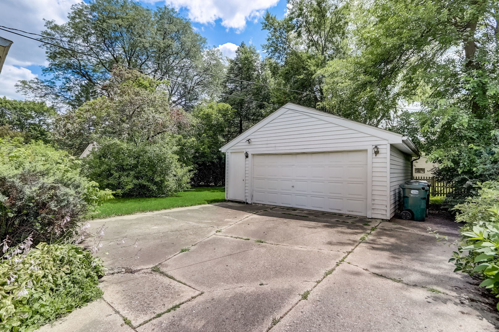 547 East Baldwin Road Palatine, IL 60074 - Photo 25 of 26 a view of a small space in front of a house with large trees