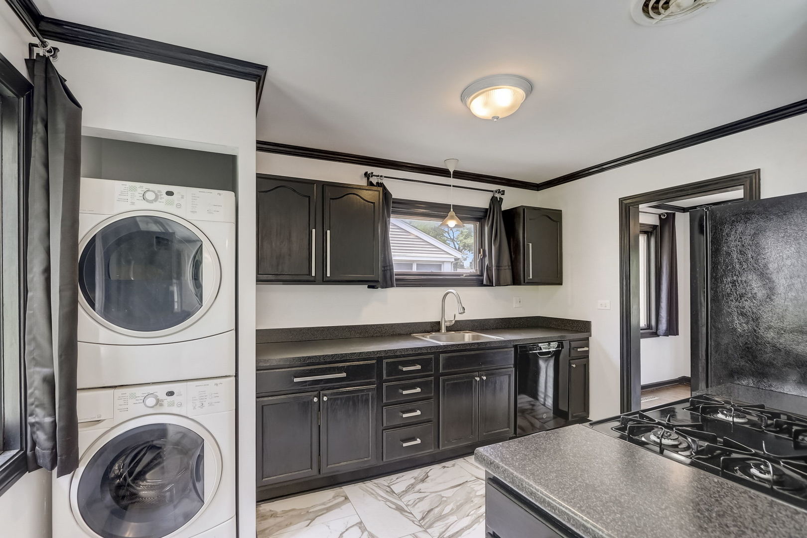 547 East Baldwin Road Palatine, IL 60074 - Photo 10 of 26 a kitchen with stainless steel appliances granite countertop a stove a sink and a refrigerator