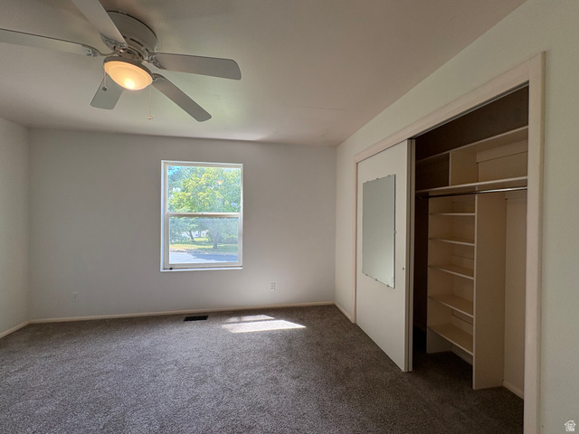 595 Meadowlark Road Orem, UT 84097 - Photo 37 of 87 Room featuring a window, ceiling fan with integrated lighting, and carpeted flooring