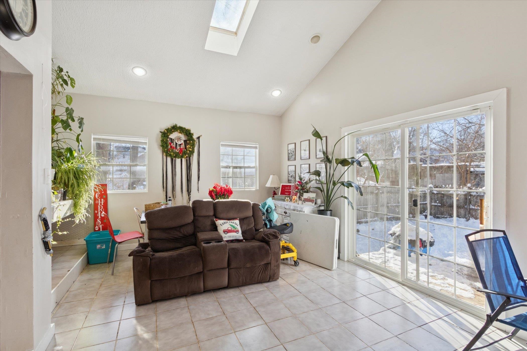 418 Adams Street Rockford, IL 61107 - Photo 16 of 26 a living room with furniture and a potted plant