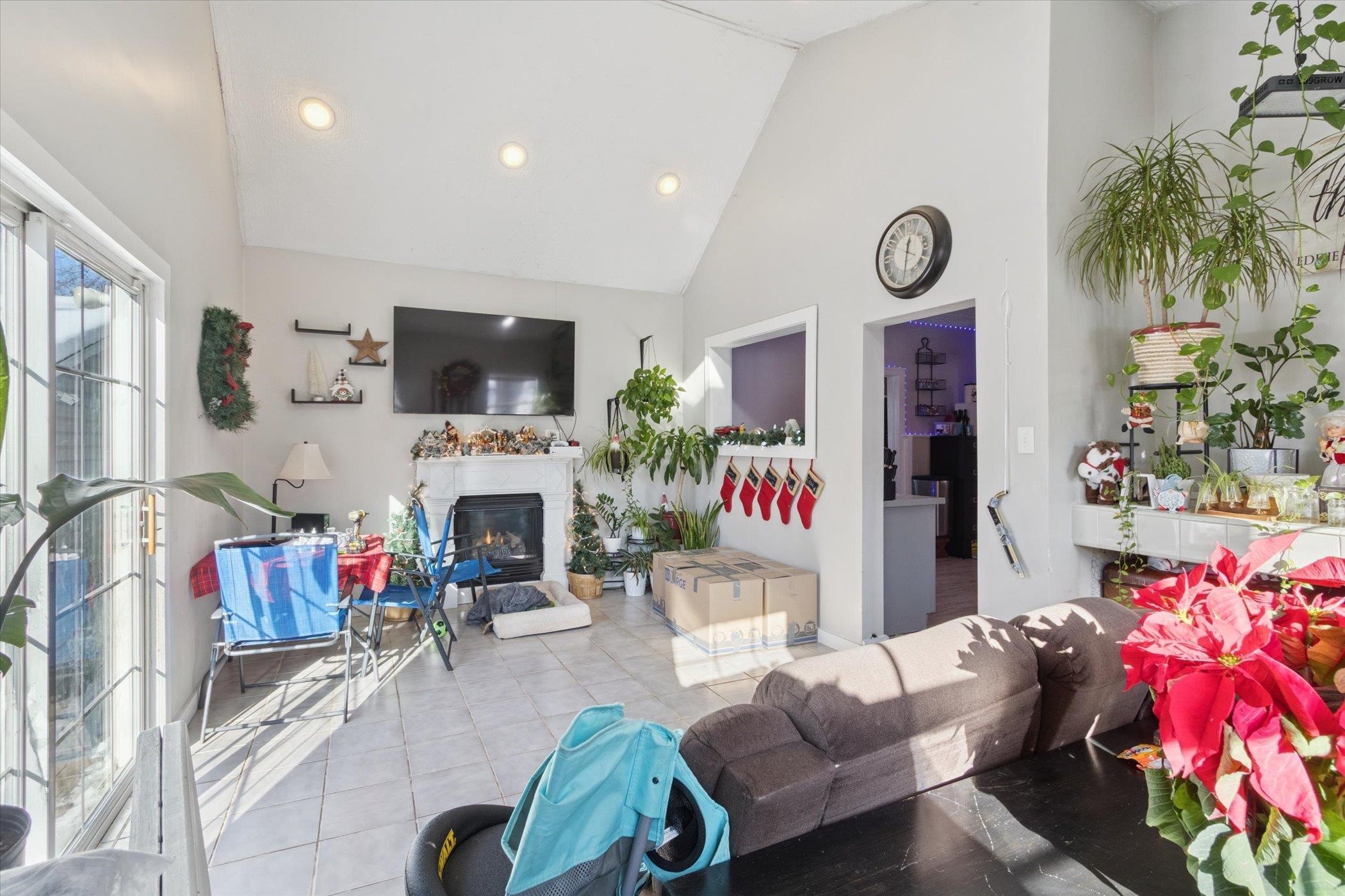 418 Adams Street Rockford, IL 61107 - Photo 17 of 26 a living room with furniture and a fireplace