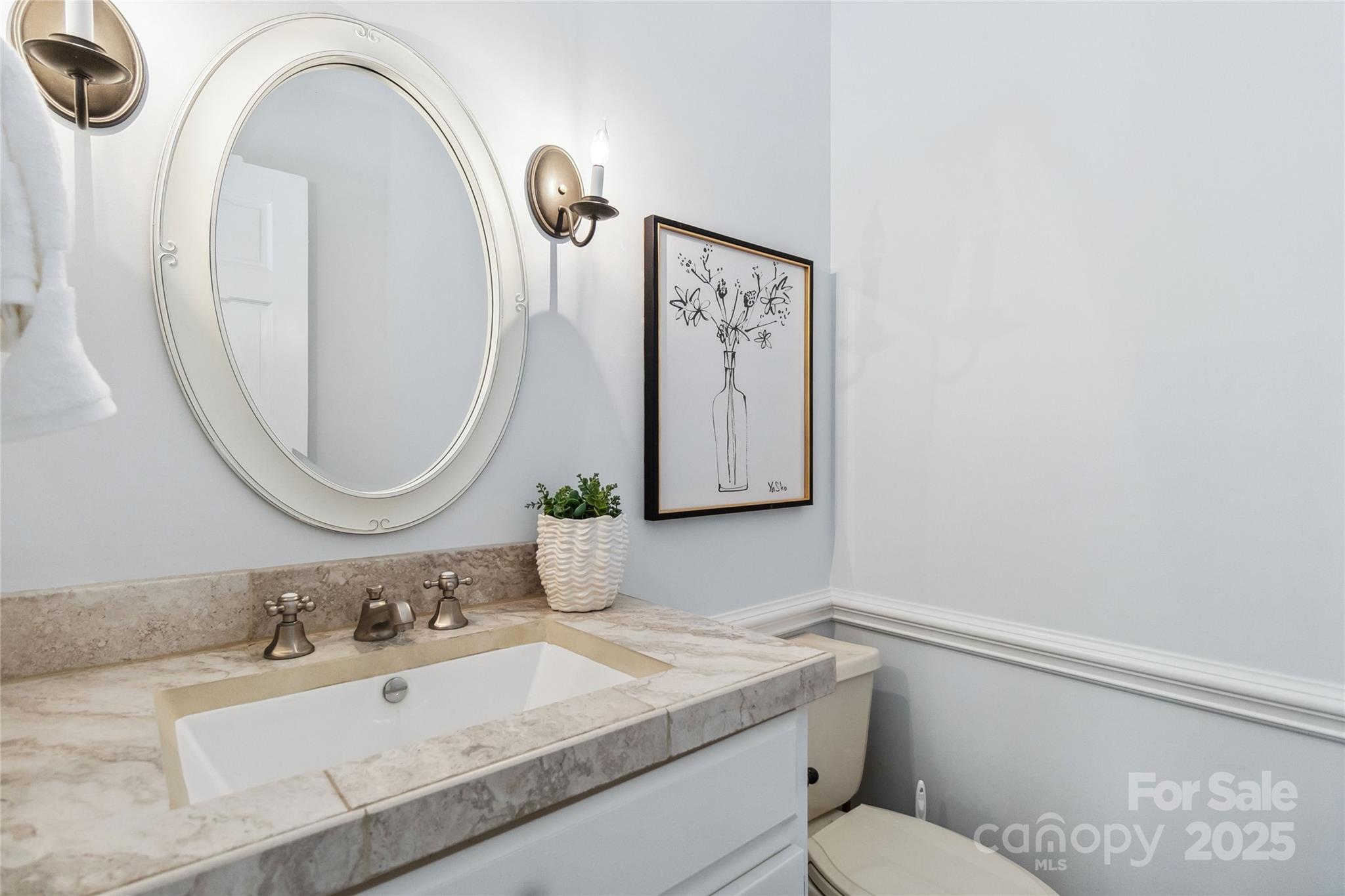 725 Stanhope Lane Matthews, NC 28105 - Photo 25 of 46 a bathroom with a granite countertop toilet sink mirror and vanity