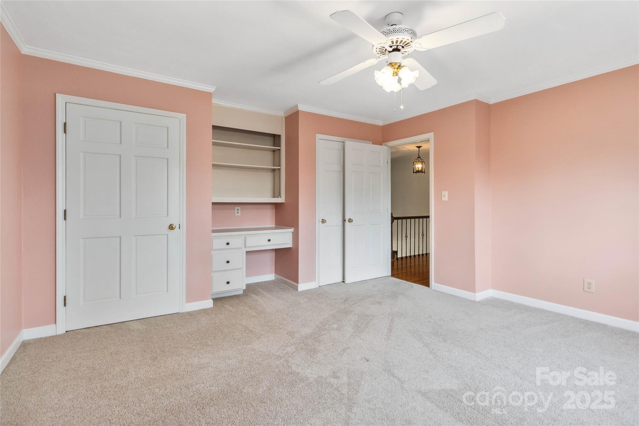 725 Stanhope Lane Matthews, NC 28105 - Photo 30 of 46 a view of a room with cabinet and a ceiling fan