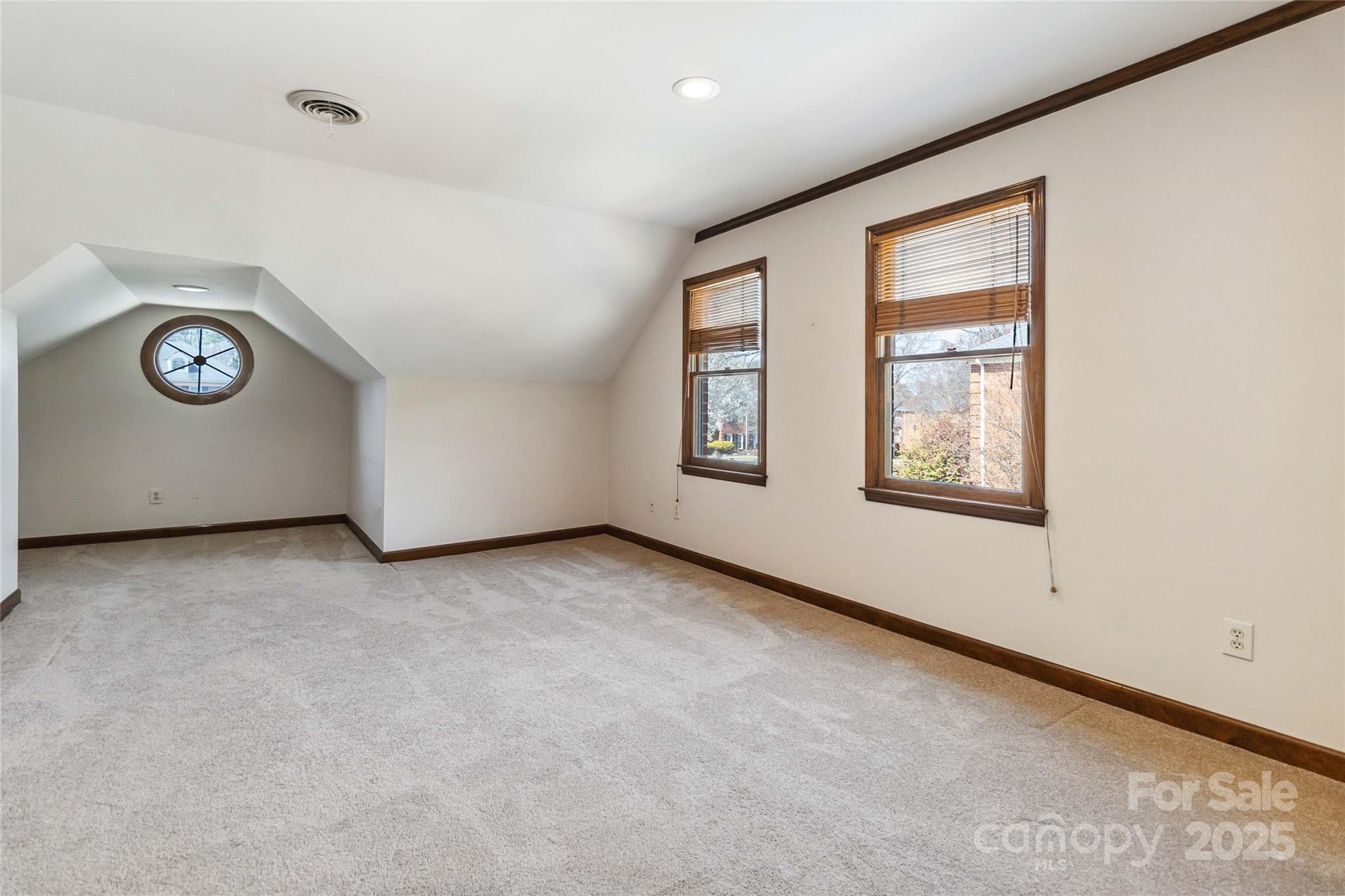 725 Stanhope Lane Matthews, NC 28105 - Photo 32 of 46 an empty room with windows