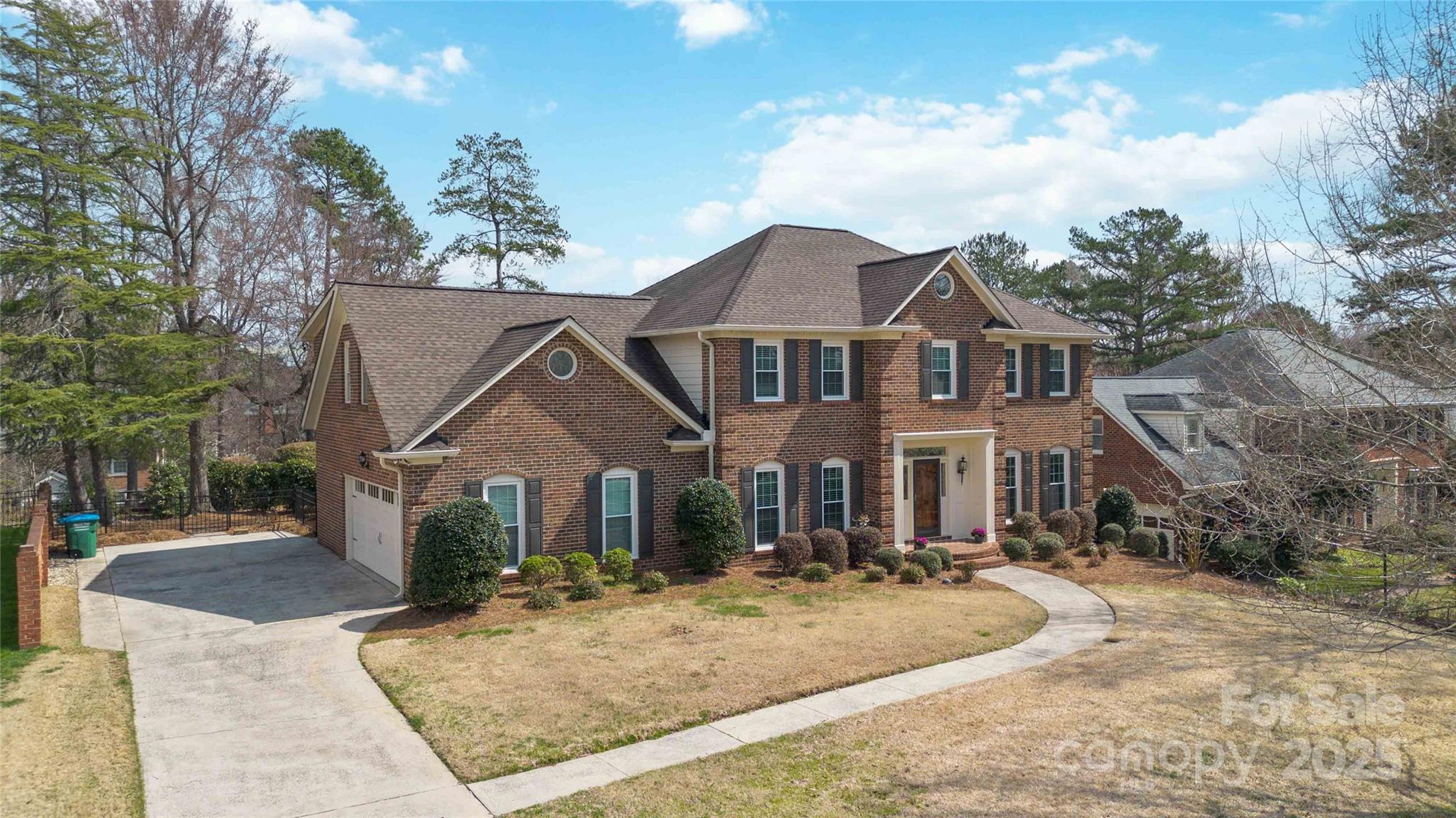 725 Stanhope Lane Matthews, NC 28105 - Photo 38 of 46 a front view of a house with a yard
