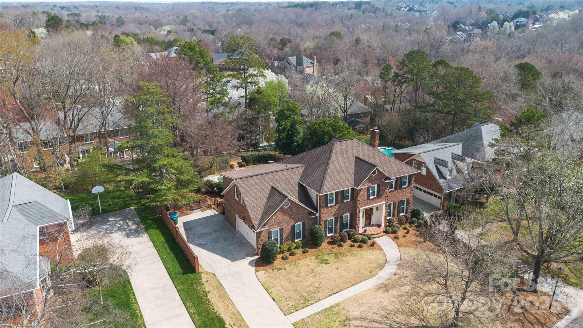 725 Stanhope Lane Matthews, NC 28105 - Photo 39 of 46 an aerial view of a house with yard and green space