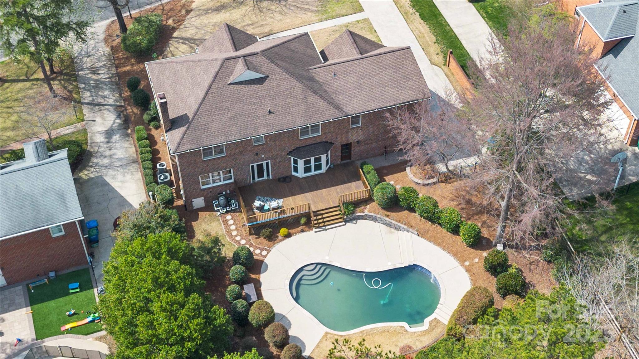 725 Stanhope Lane Matthews, NC 28105 - Photo 43 of 46 an aerial view of a house with a yard and outdoor seating