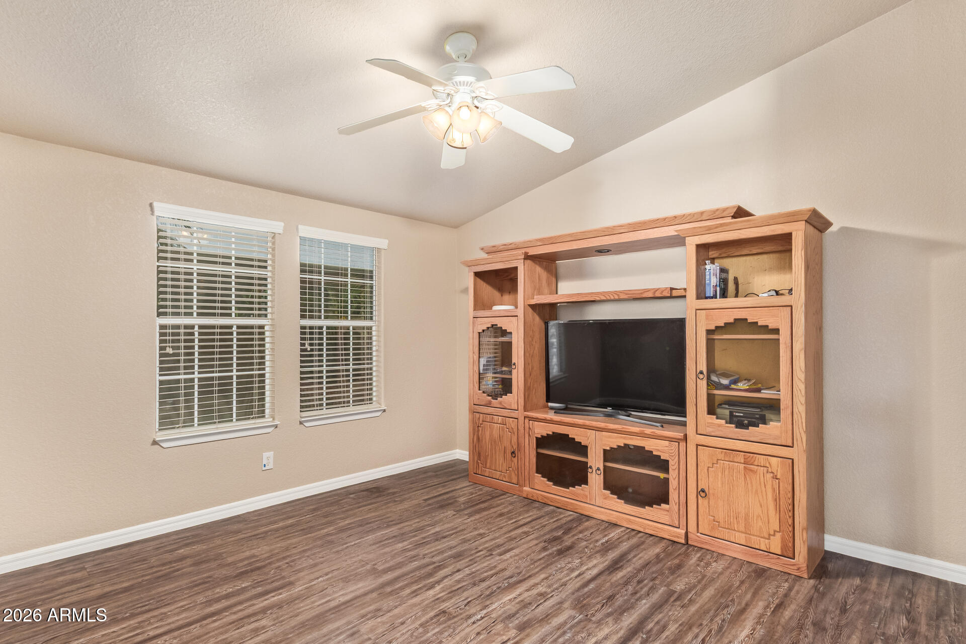3301 South Goldfield Road, Unit 4028 Apache Junction, AZ 85119 - Photo 6 of 43 a view of a livingroom with a flat screen tv