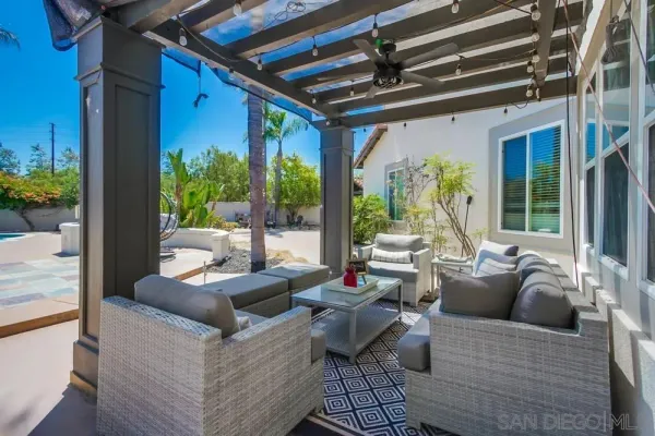 a view of yard with patio and outdoor seating