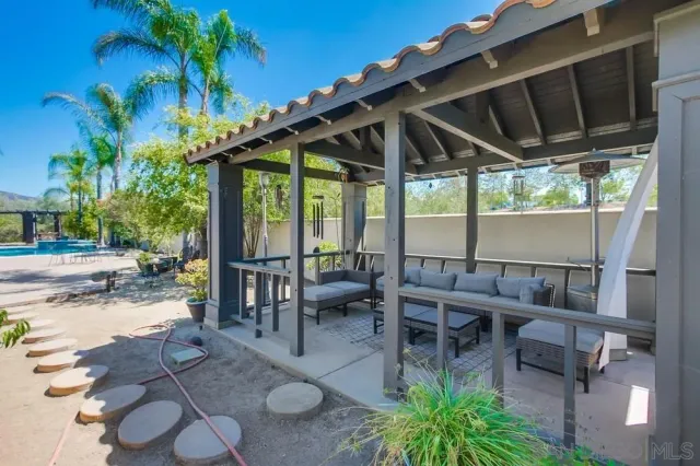 a view of multiple houses with a yard