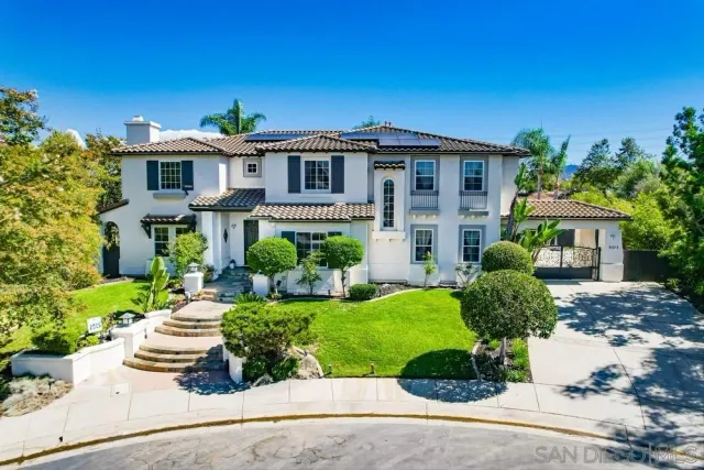 a view of a city with mountains in the background