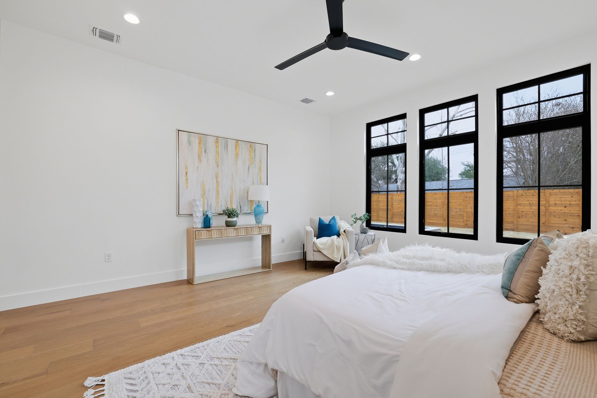 6611 Lexington Road Austin, TX 78757 - Photo 20 of 37 Spacious interior room featuring wood-finish flooring, recessed lighting, and a modern ceiling fan