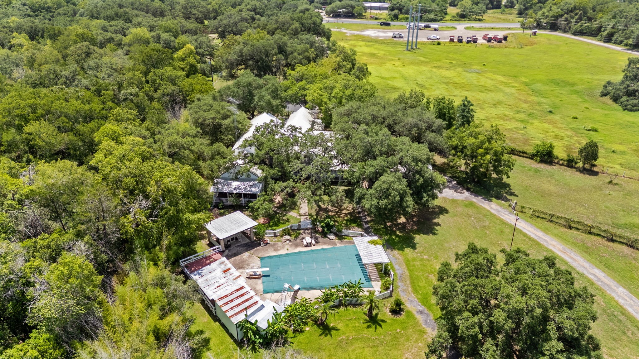 3541 Highway 159 La Grange, TX 78945 - Photo 2 of 45 an aerial view of residential houses with outdoor space and swimming pool