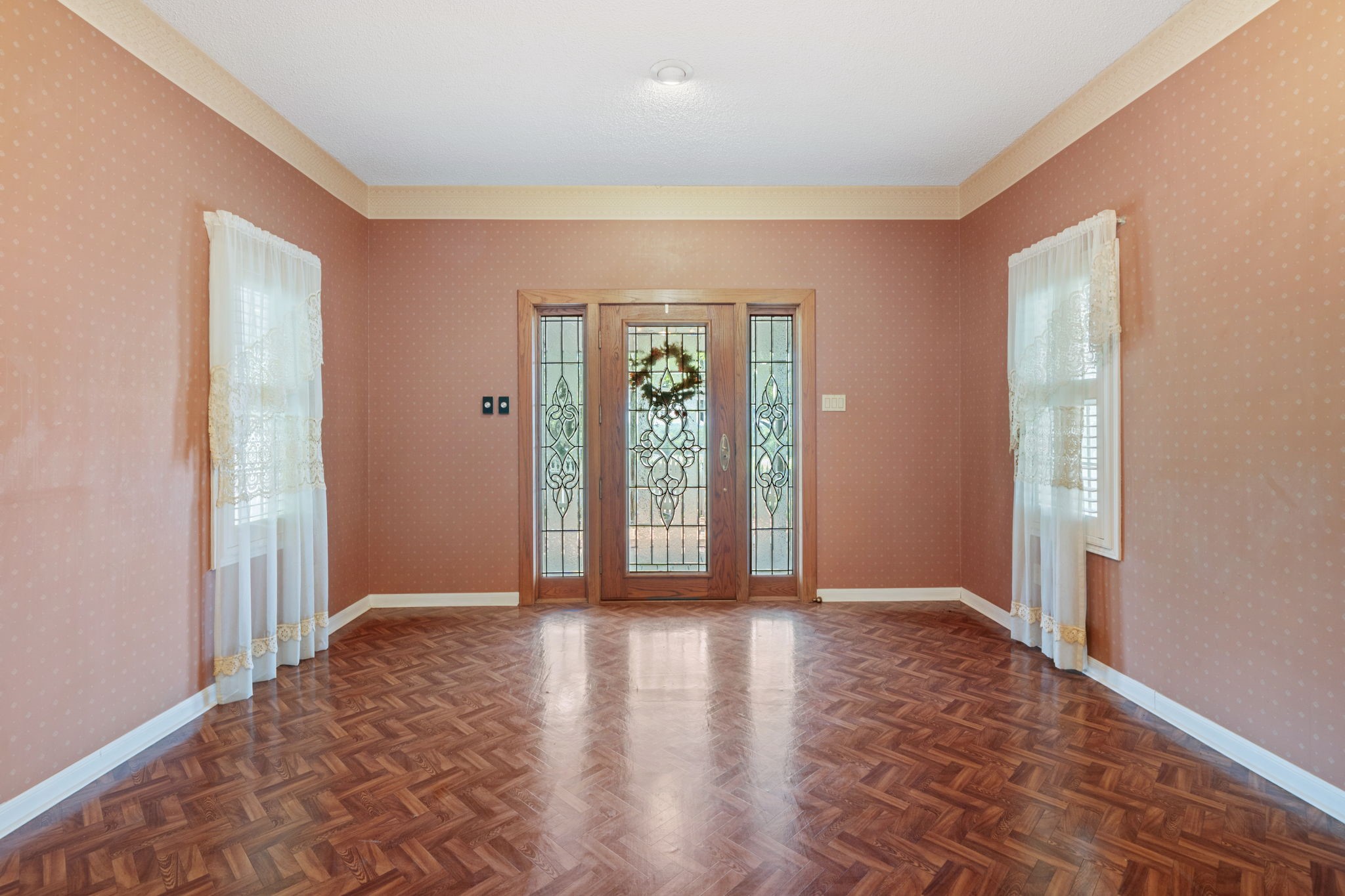 3541 Highway 159 La Grange, TX 78945 - Photo 7 of 45 a view of an empty room with wooden floor and a window
