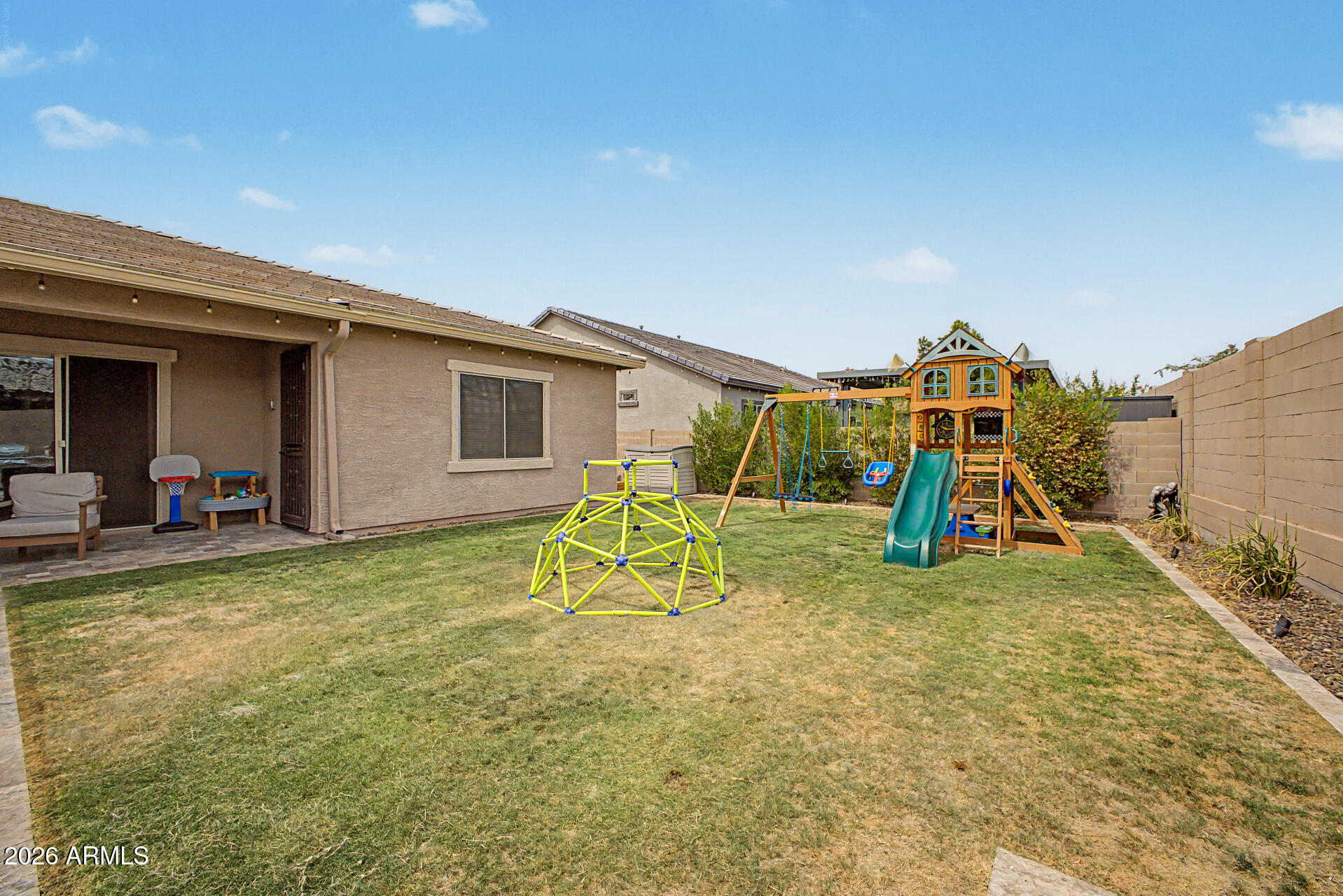 6511 West Steed Ridge Phoenix, AZ 85083 - Photo 35 of 41 a view of playground with a slide and swing